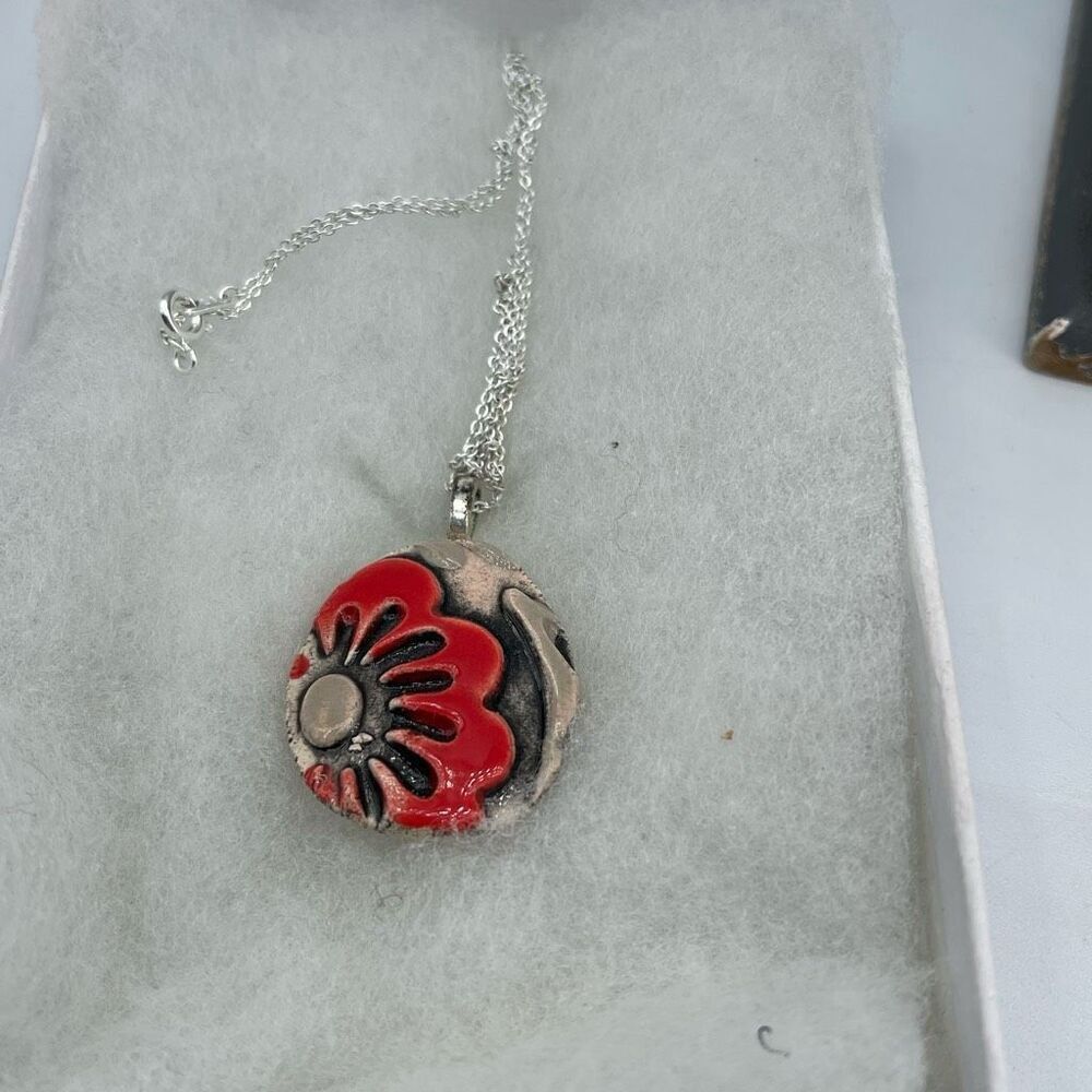Artisan Cheryl Steveris floral handmade pendant necklace.